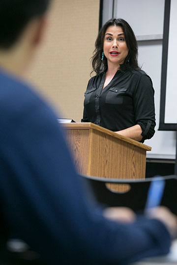 Rachel Baribeau speaking in classroom