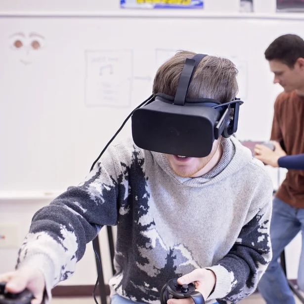 student in VR headset