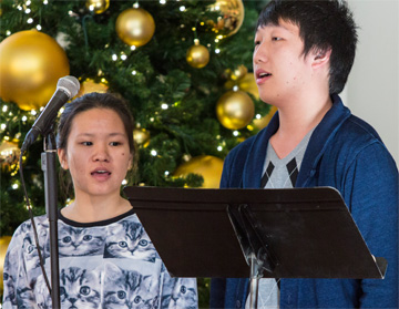 Students Sing in Christmas Around the World Event
