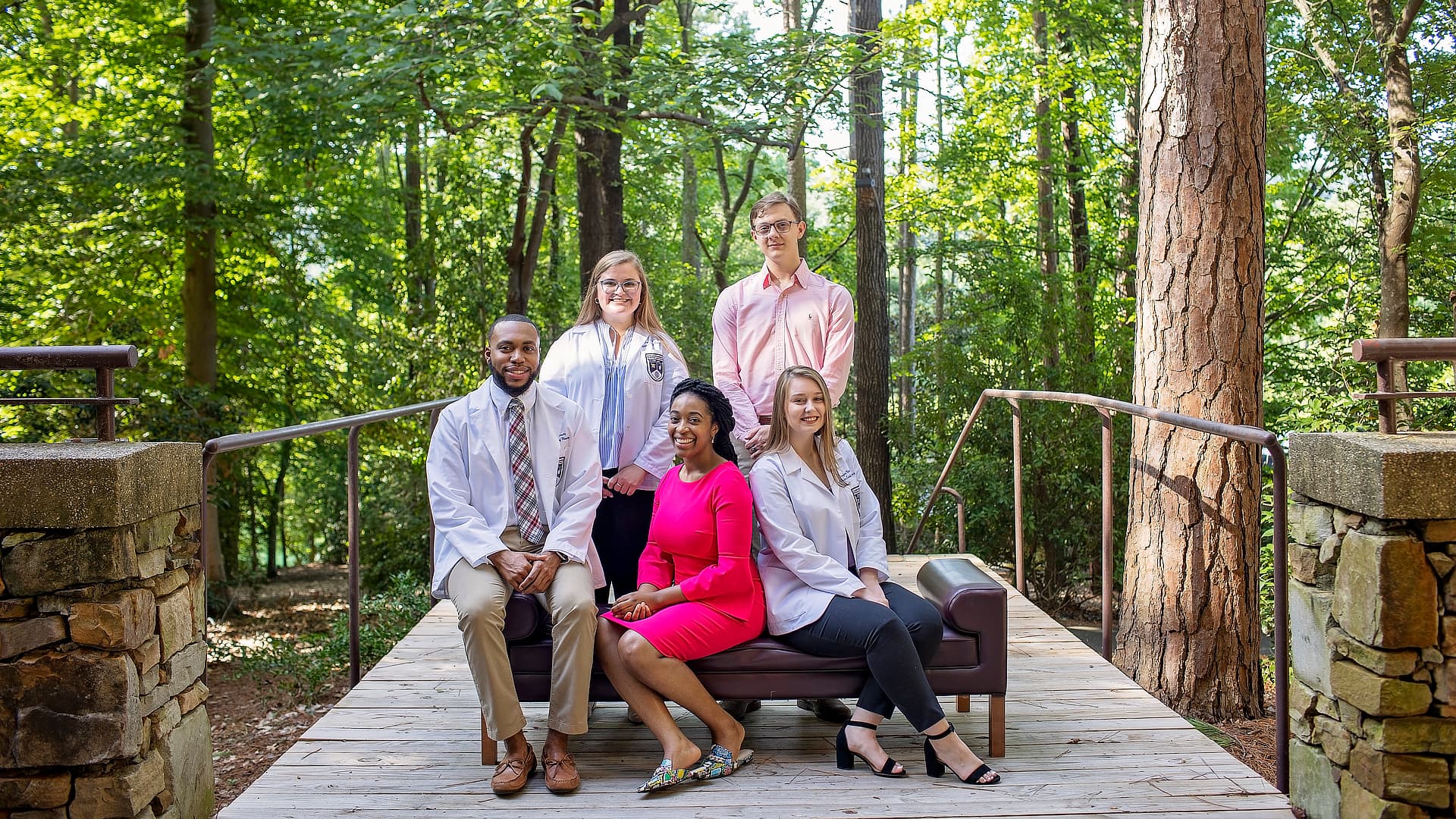 five pharmacy students among the trees