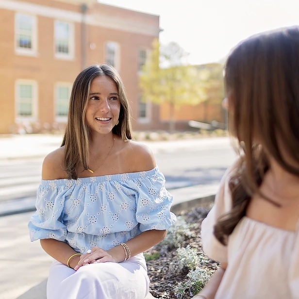 two female students talking