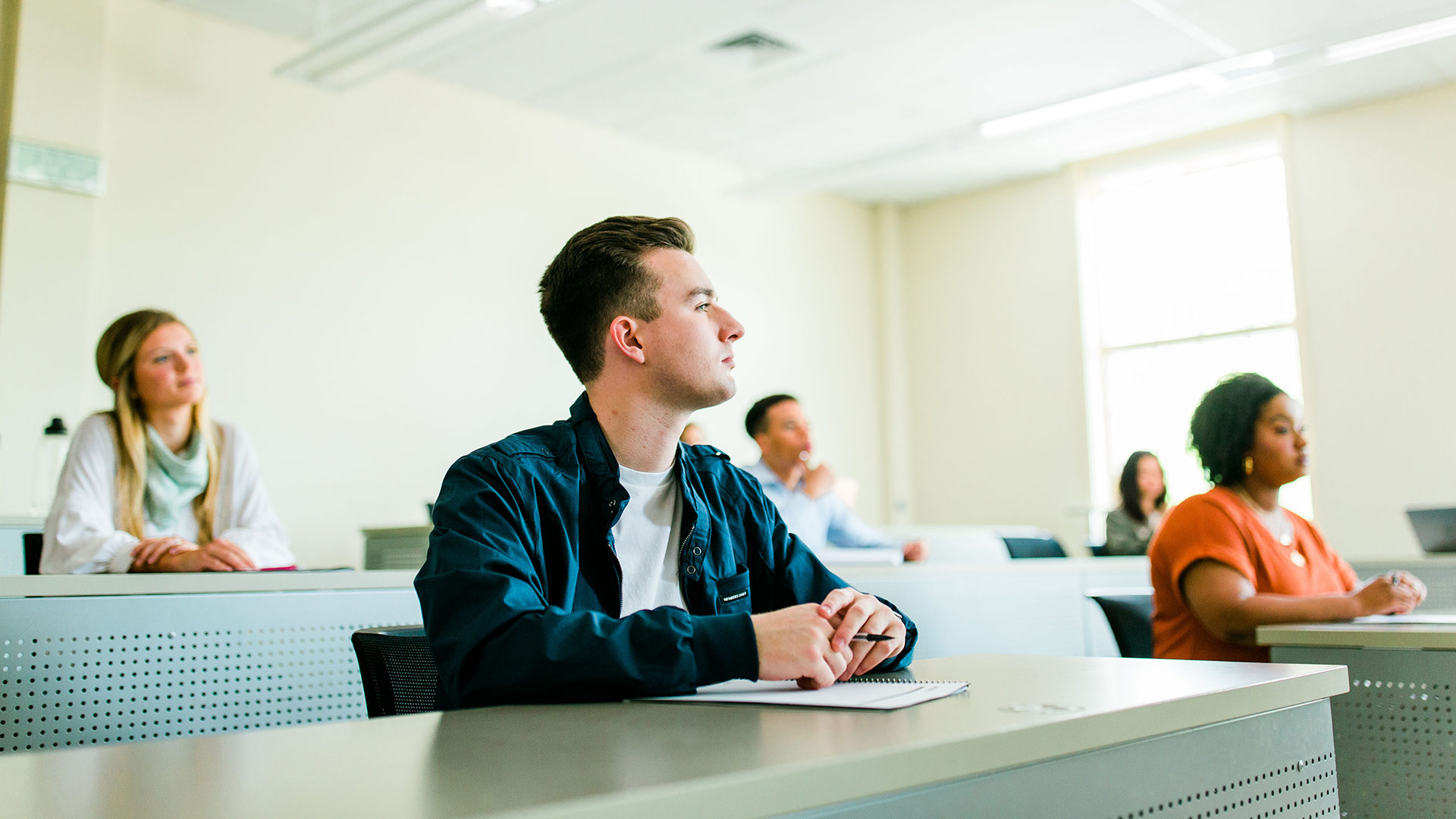 student inside classroom banner