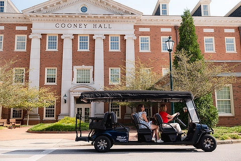 admission golf cart touring campus