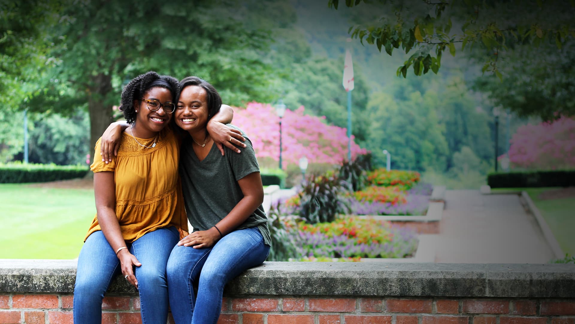 Two female students hugging