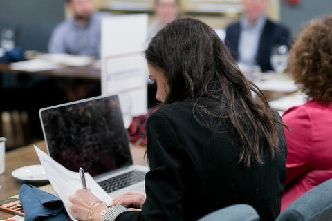 woman with laptop at meeting