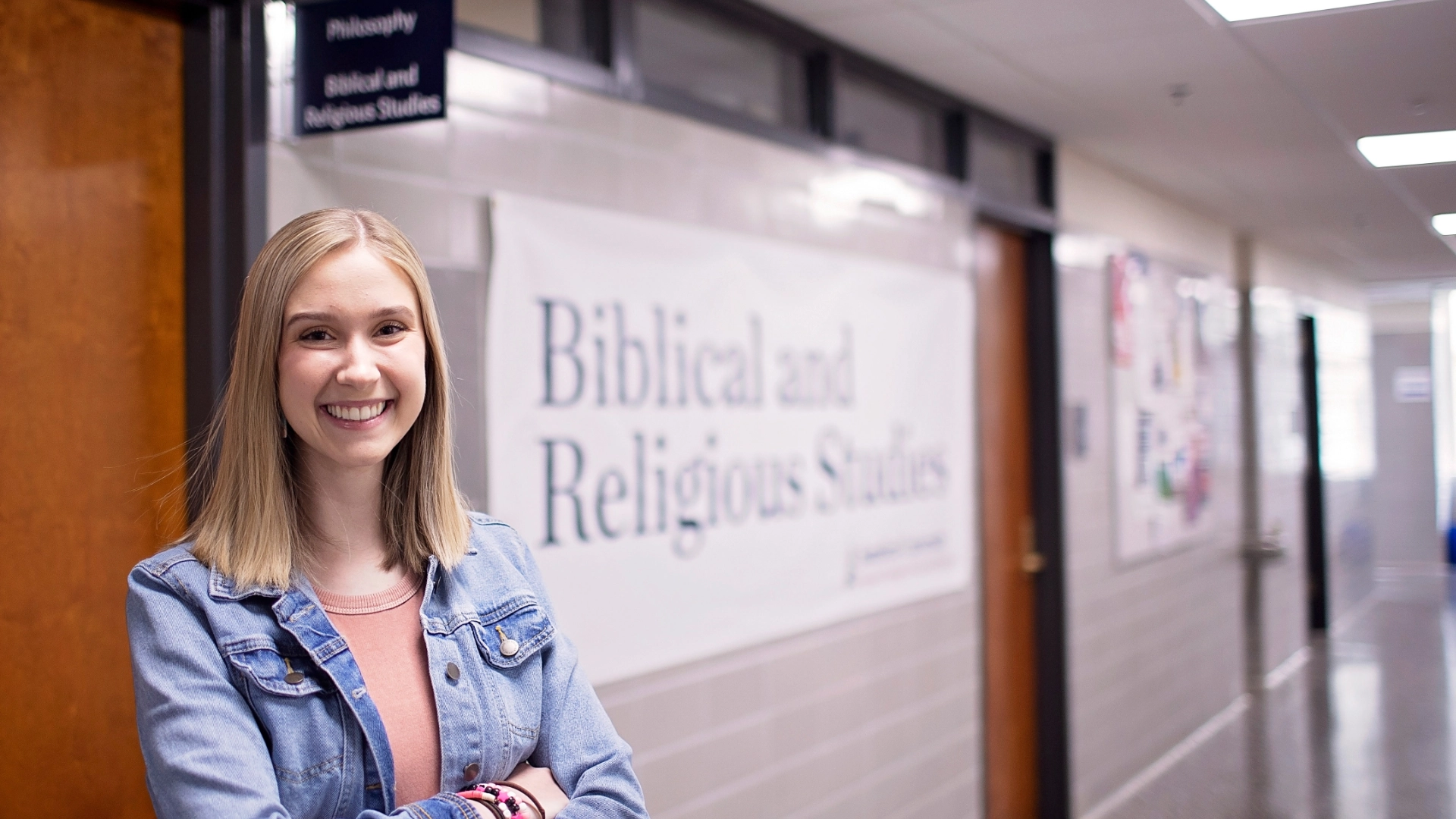 Biblical And Religious Studies Female Student in Hallway