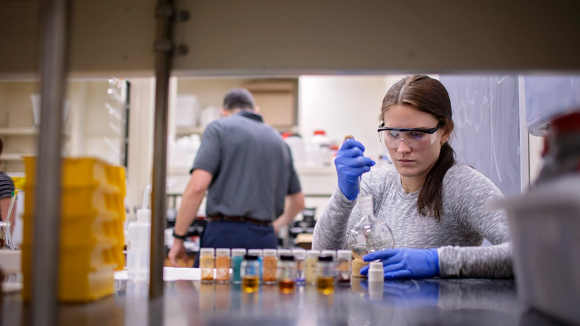 Female Student Working On Project In Lab