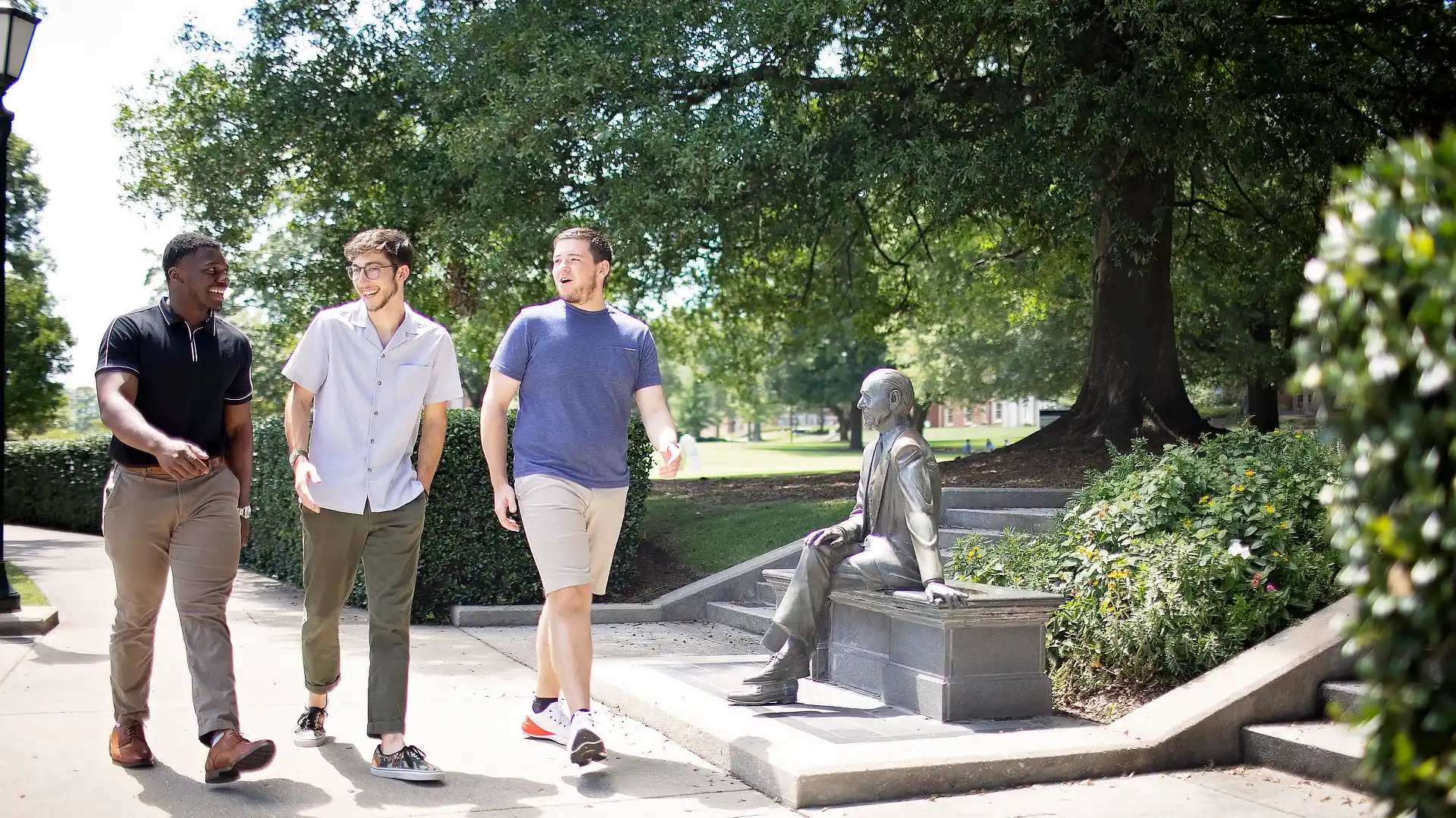 Three STEM Students Walking In Quad