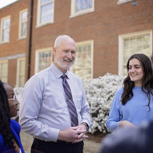 language teacher outside with students