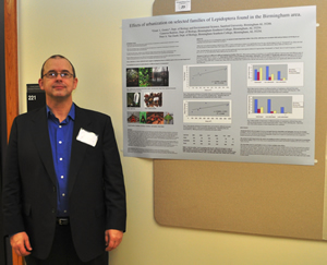 Grant Gentry with poster presentation