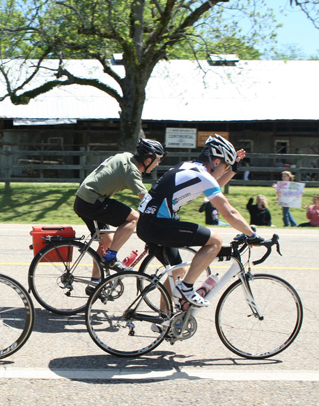 Cyclists Ride in the Old Howard 100