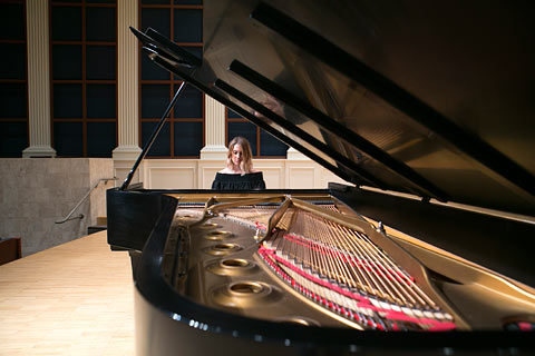 Female Performer Playing Piano