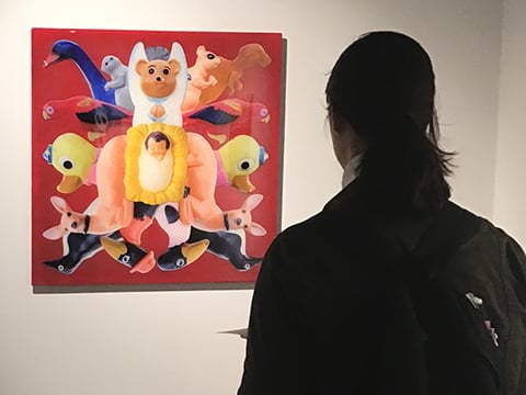 Student viewing image in Art Gallery