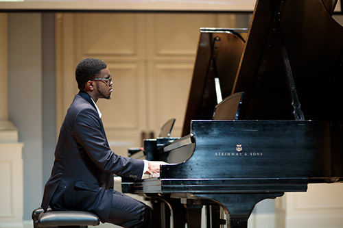 Student playing piano