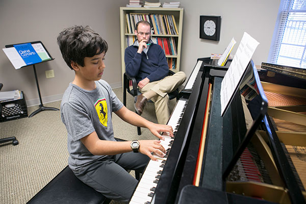 Piano Student and Teacher