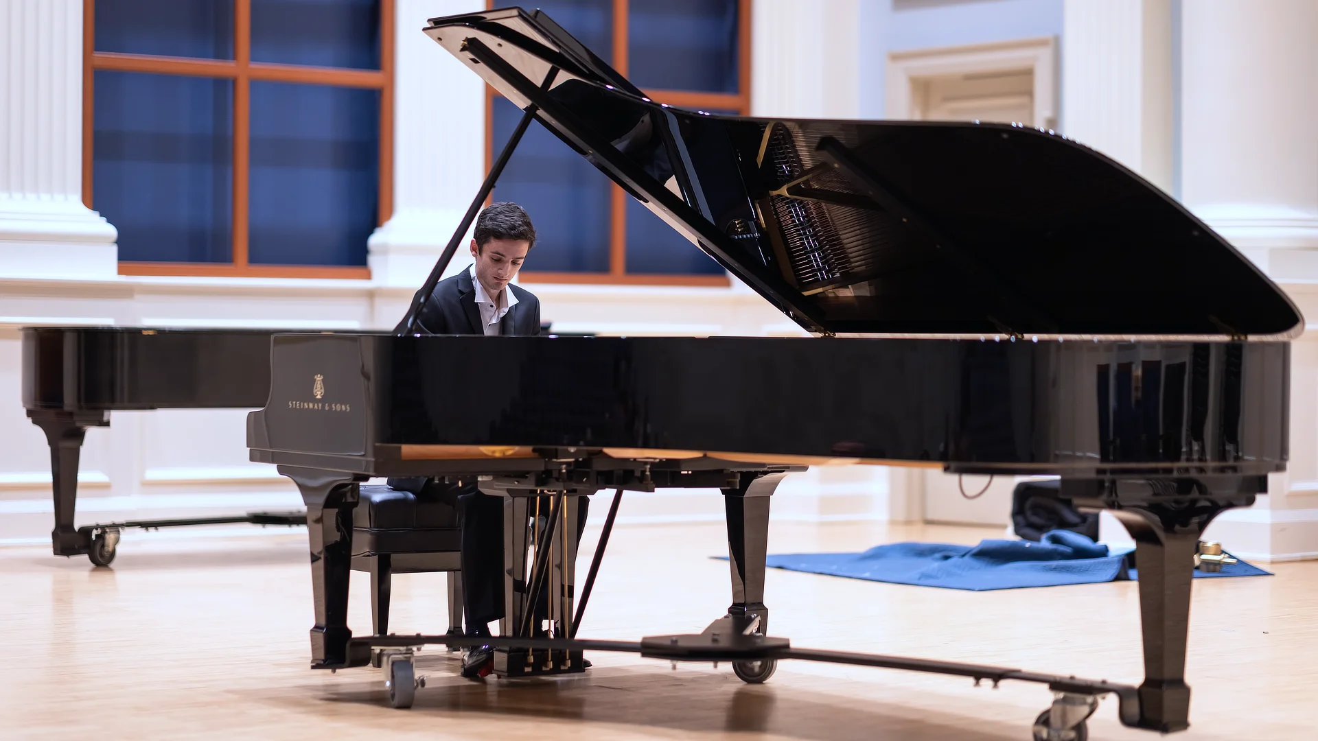 Male Student at Grand Piano
