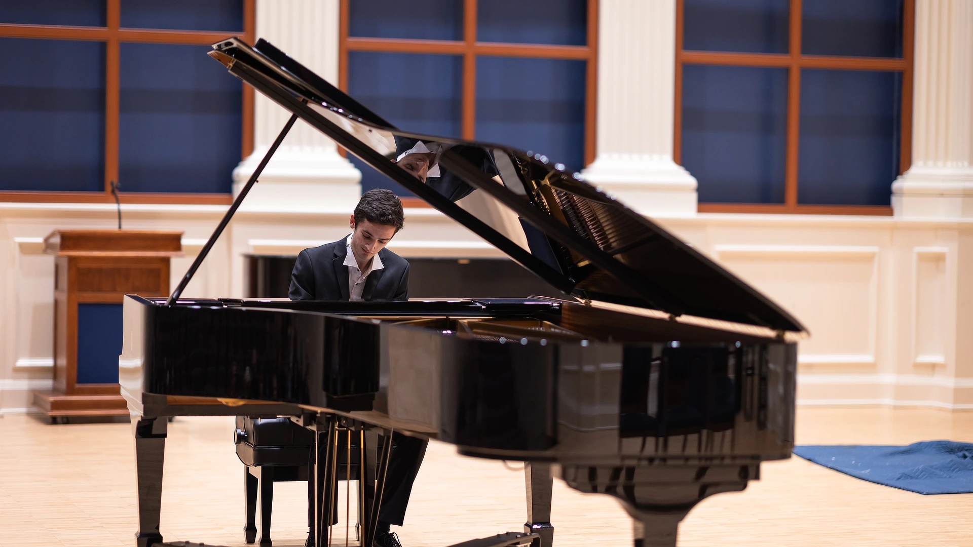 student playing the piano