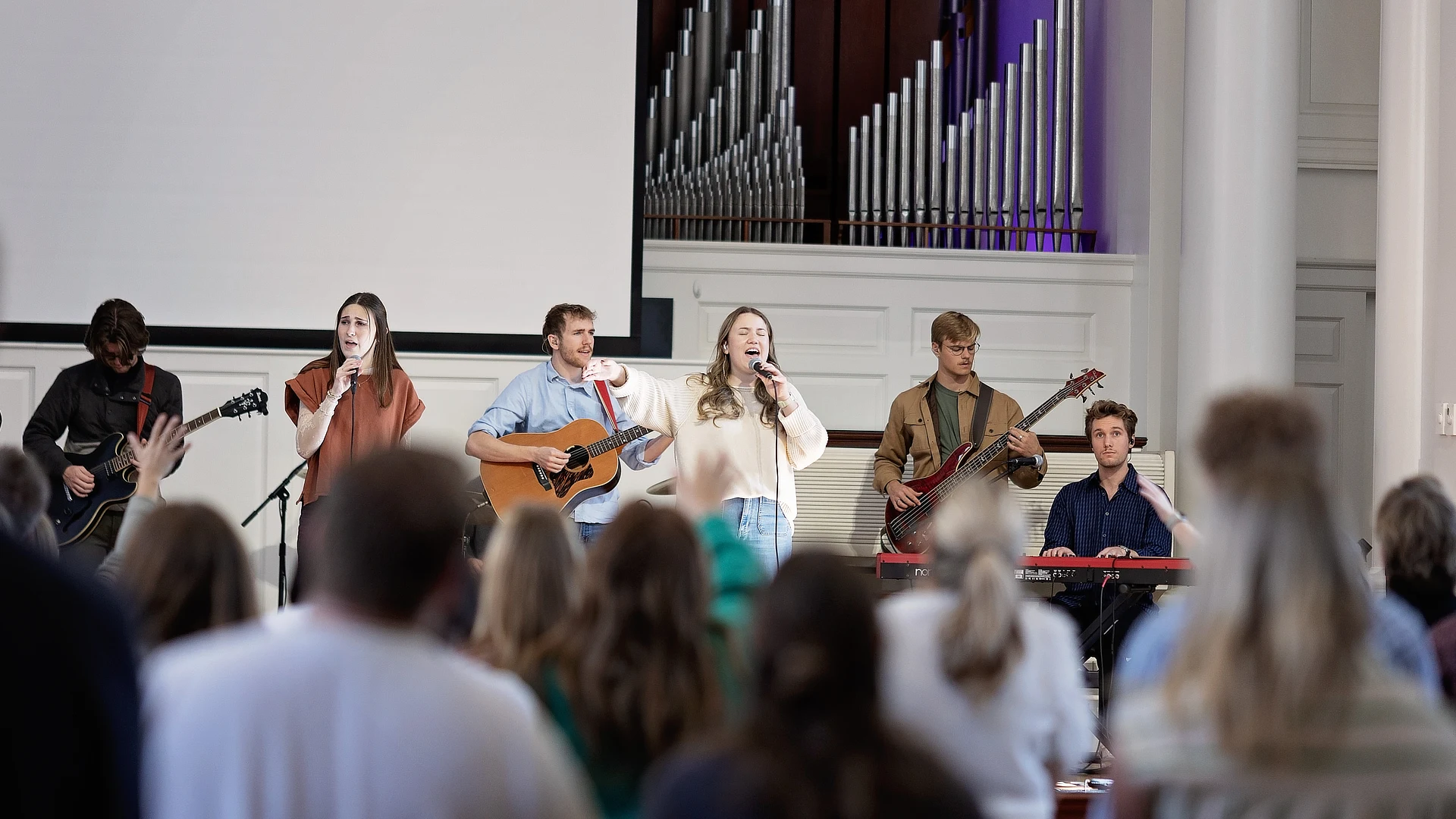 students leading worship