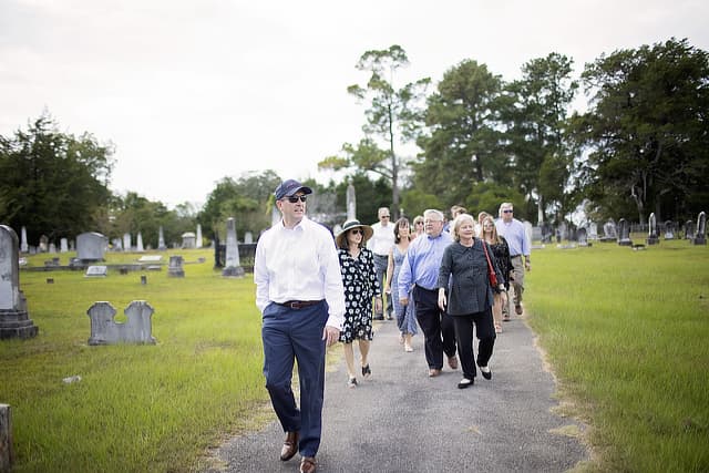 students walking through the cemetery DR09252022651