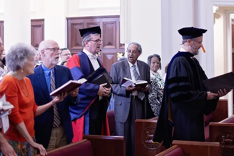 faculty in the chapel