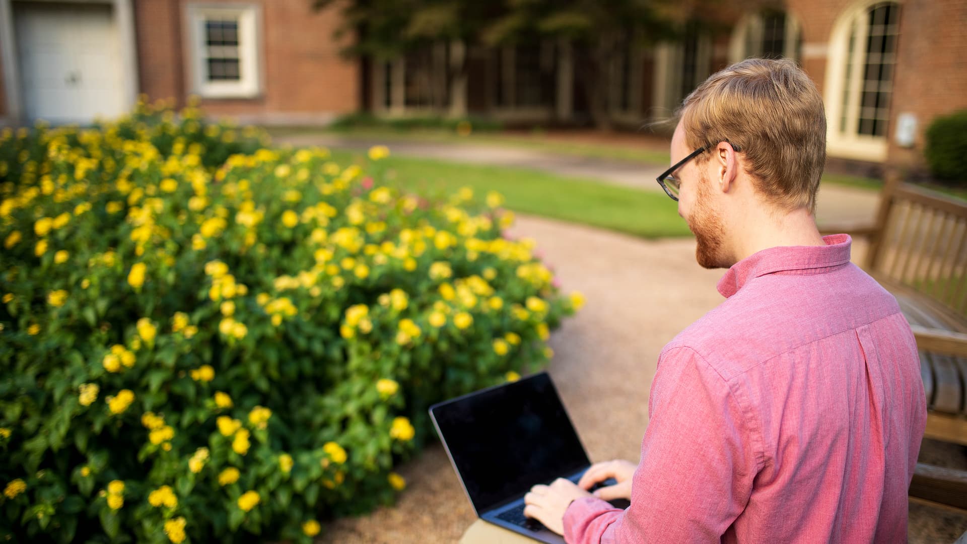 Man in Garden with Laptop