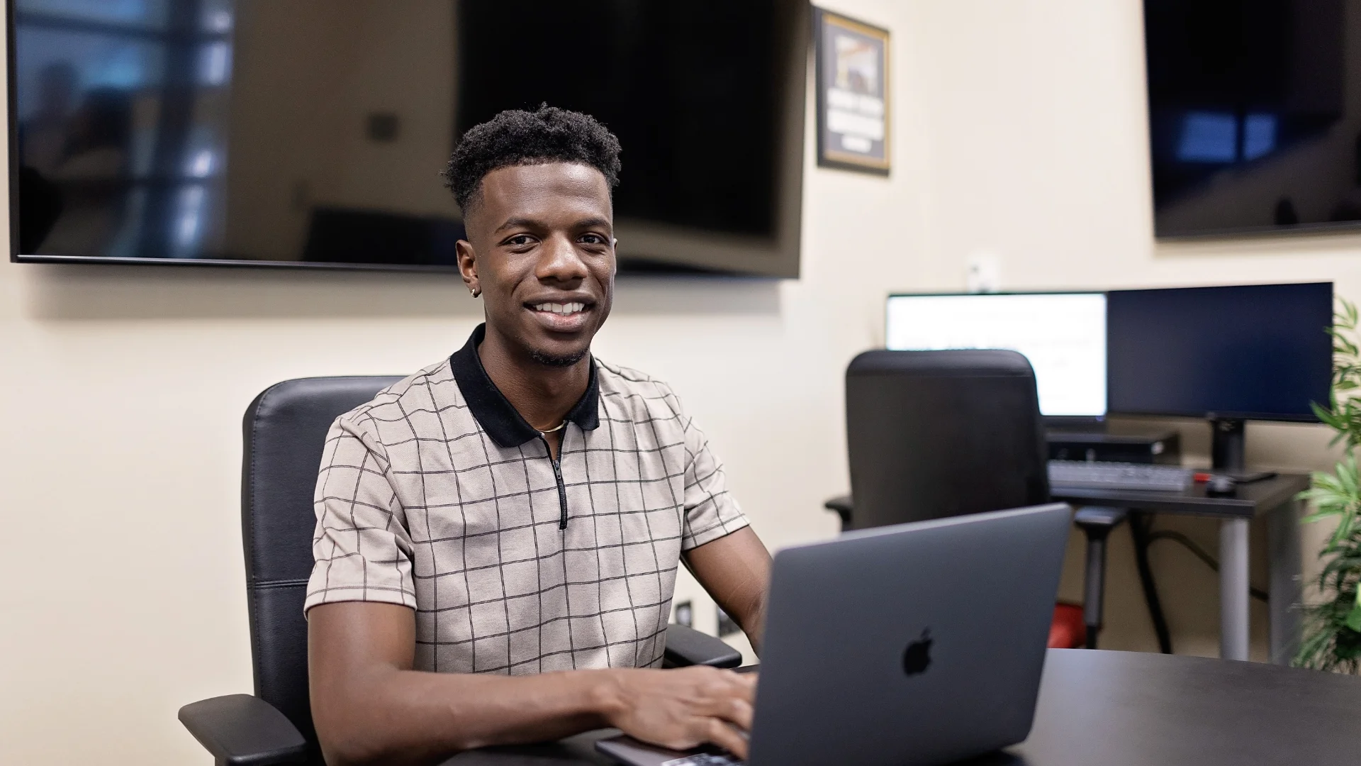 male business student at laptop