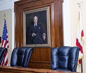 A portrait of Cordell Hull is located in the John L. Carroll Moot Courtroom.