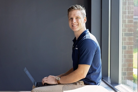 Male Student on Computer