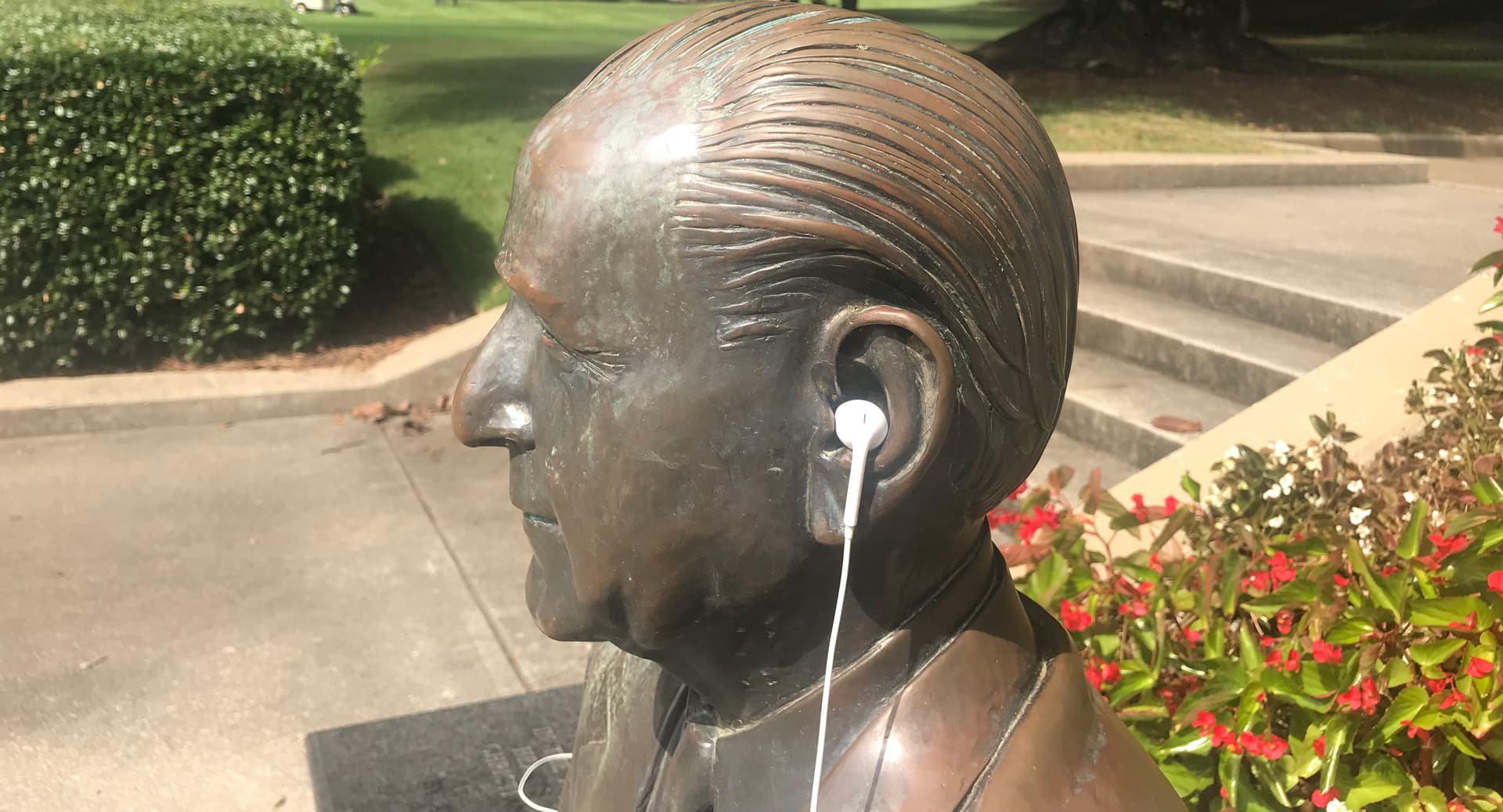 mr beeson statue ear phones