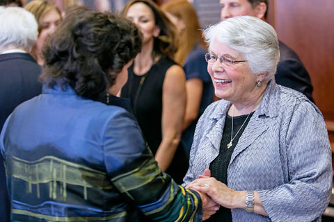 Marla Corts shaking hands