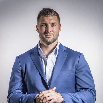 Tim Tebow in blue suit th