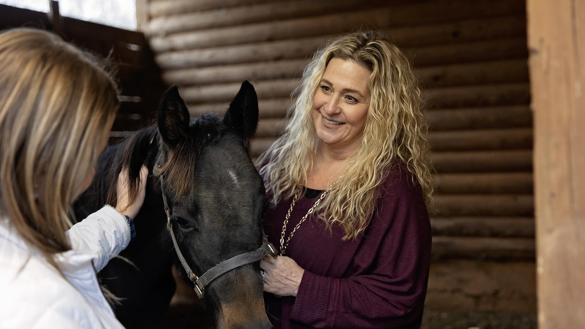 female teacher with a horse