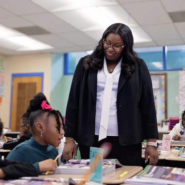 women teaching a student