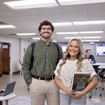 male and female student in classroom