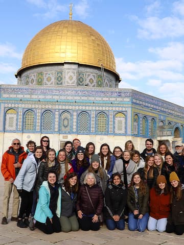 Group in front of mosque by Emily Jackson