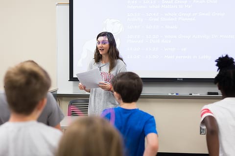 Student teaching children