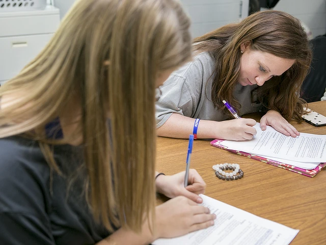 Students taking notes