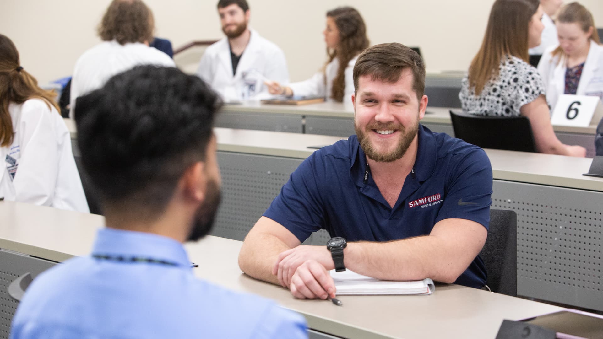 male students in group discussion BC04199569