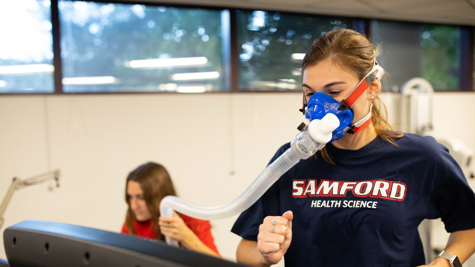 health science student on treadmill