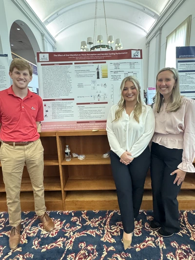Kinesiology Students with Academic Poster