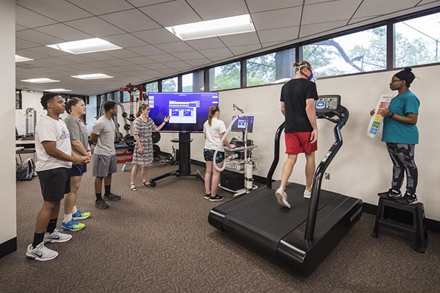 Students conduct a VO2 test in the Exercise Physiology Lab