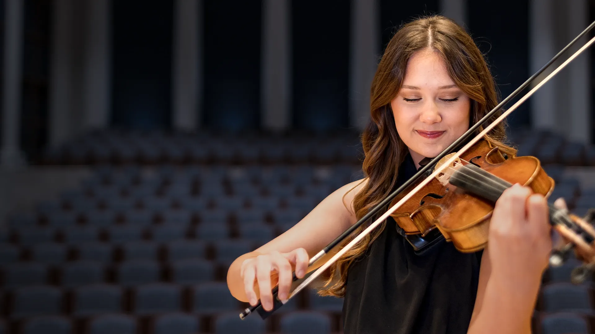 Female Student Playing Violin