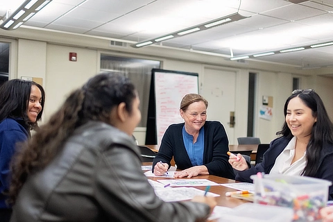 four female law students drawing