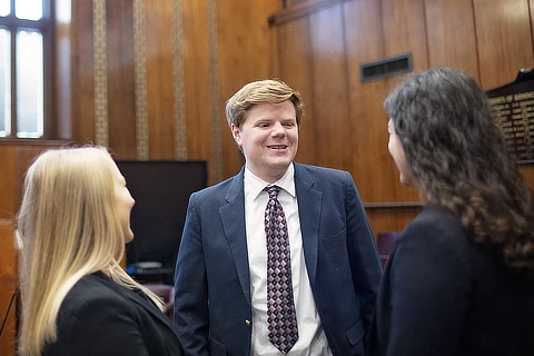 three students in a courtroom DR062220230931