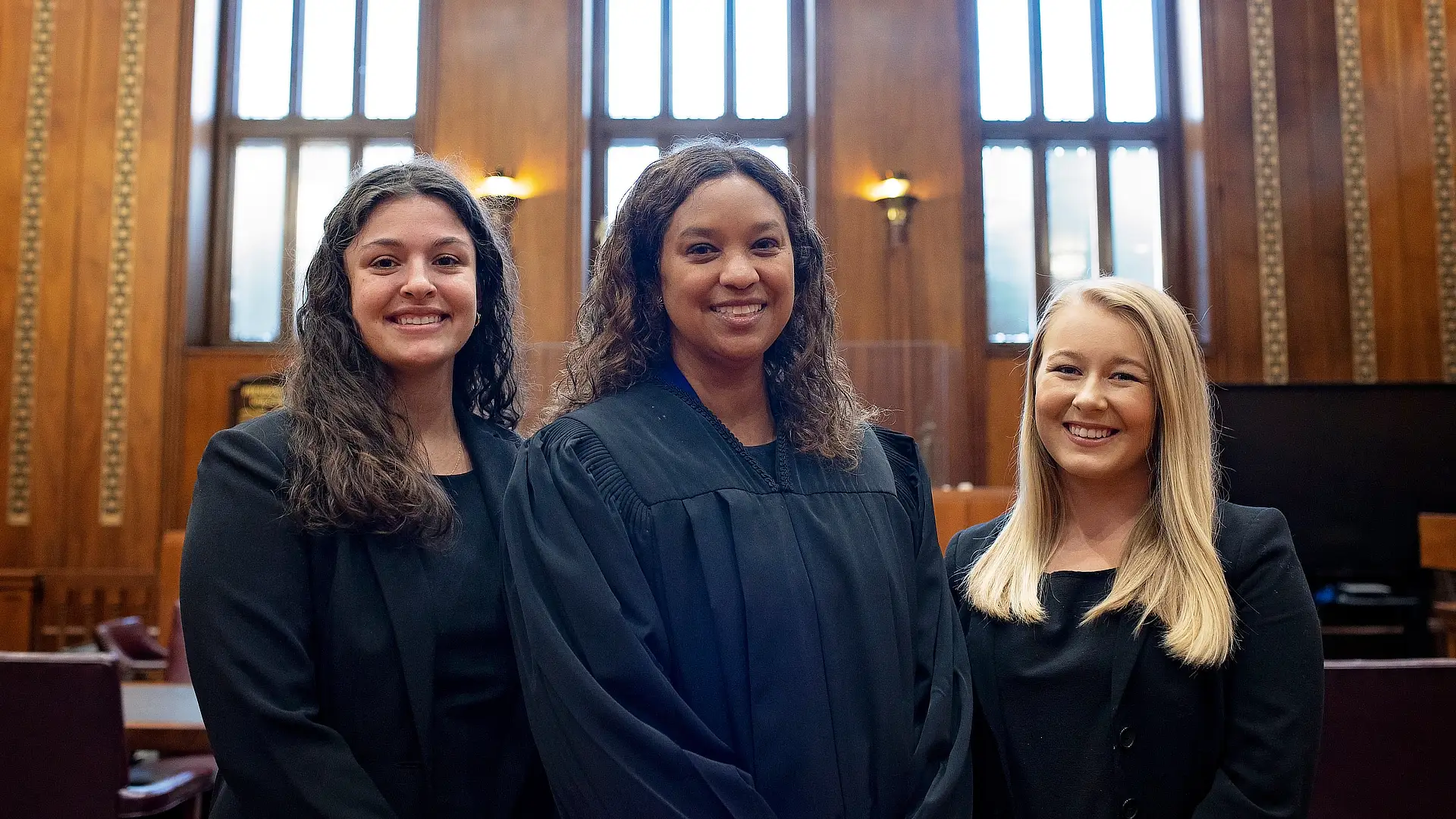 Two Female Law Students With Judge