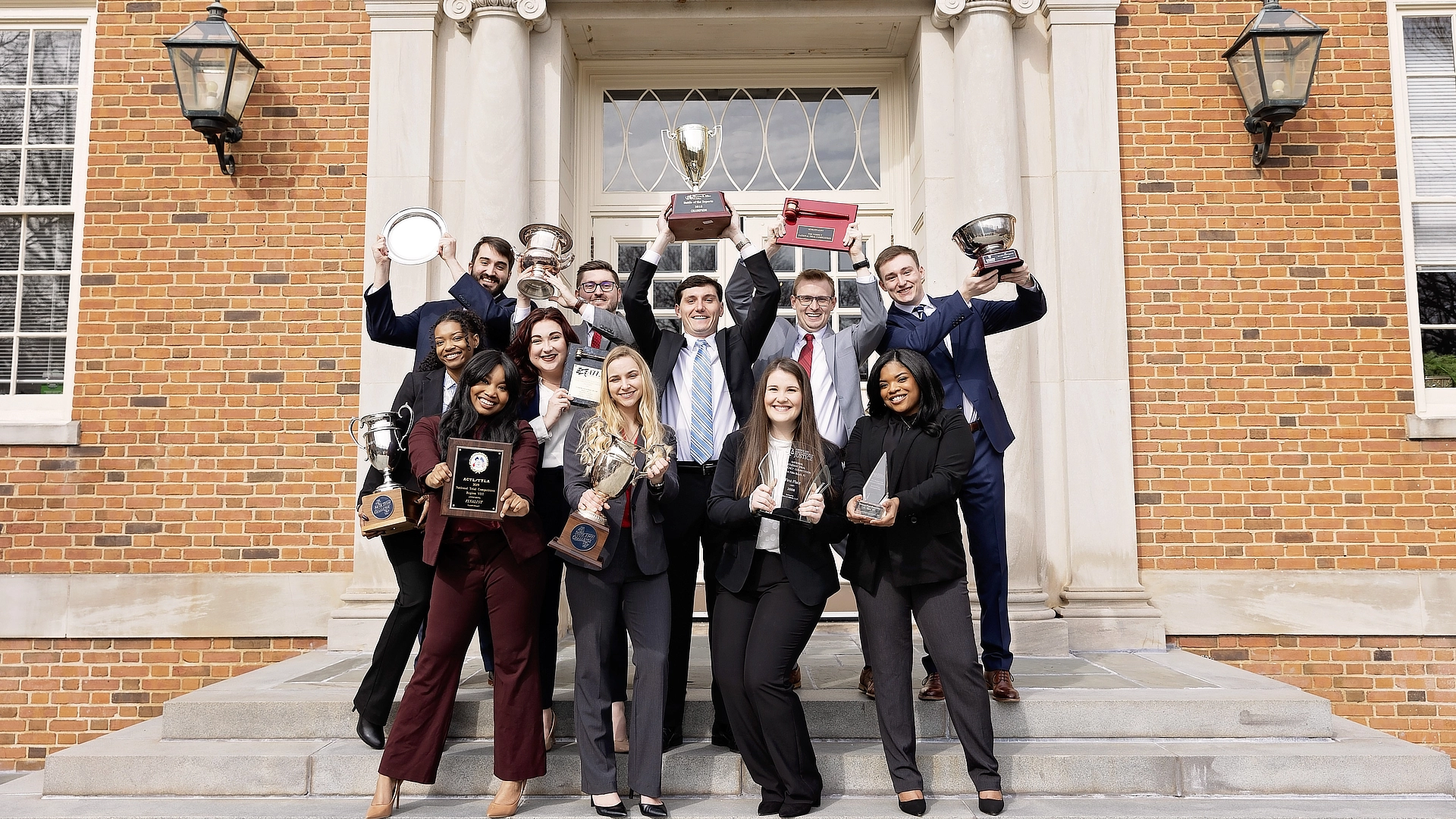 trial advocacy team with trophies