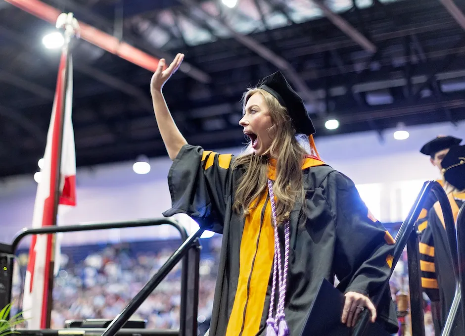 CHS Grad Smiles on Stage