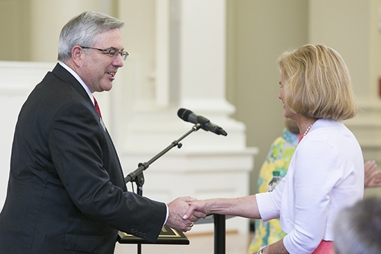 Dean Finch congratulates BSOB faculty