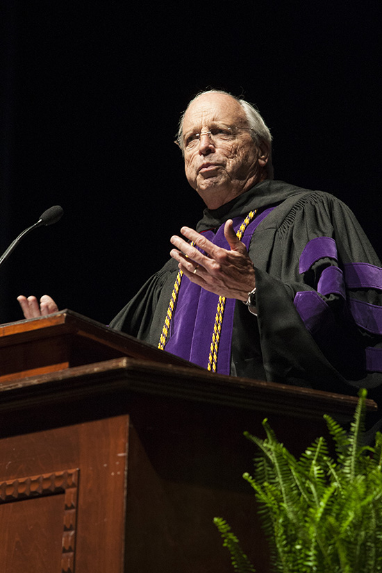 John Carroll at podium