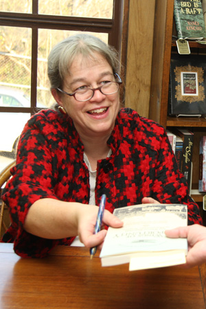 Julie Williams signing books